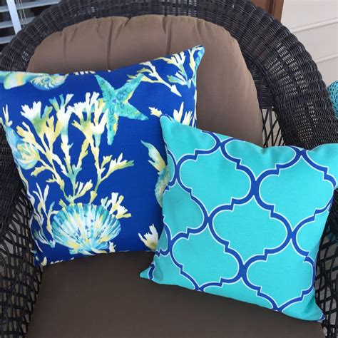 navy and turquoise pillows.